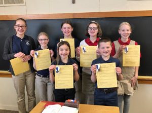 Students holding awards